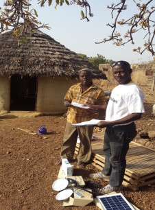 customer-signing-contract-for-pay-as-you-go-solar-system-senegal-irena